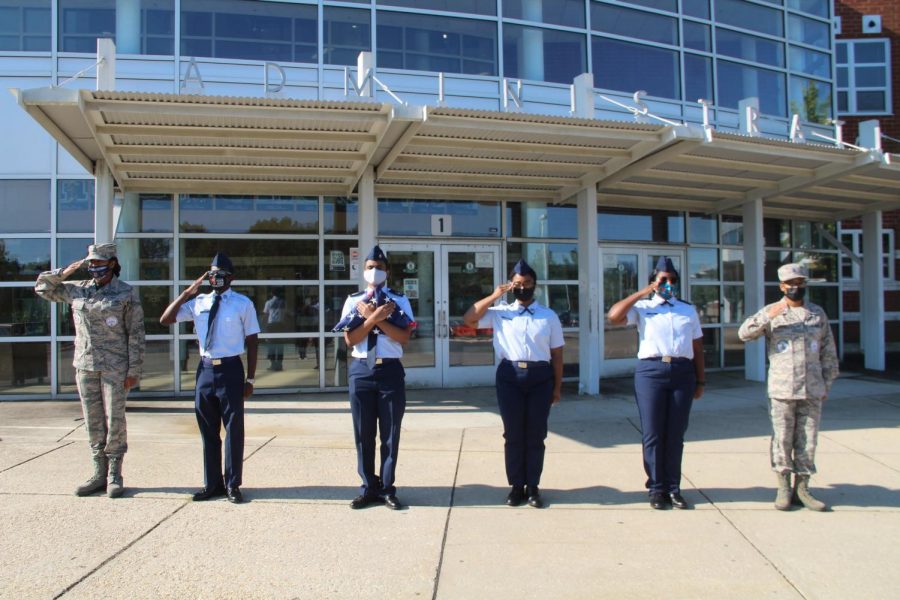 AFJROTC cadets perform their daily duty of raising the flag.